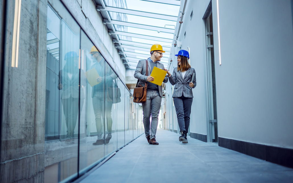 Workers Reviewing Construction Permits