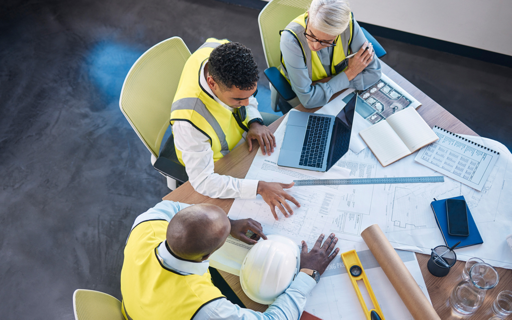 Construciton Workers Looking Over Plans
